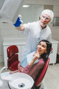 orthodontist dentist showing patient x ray photo o 2021 12 09 04 23 38 utc 1