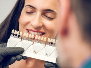 dentist picking shade of implants for veneers for 2022 01 25 14 12 13 utc 1